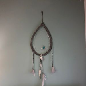 Leather, handmade dream catcher; blue stone.